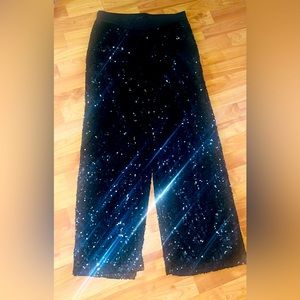 Black sequence pants, elastic waste with polyester lining.